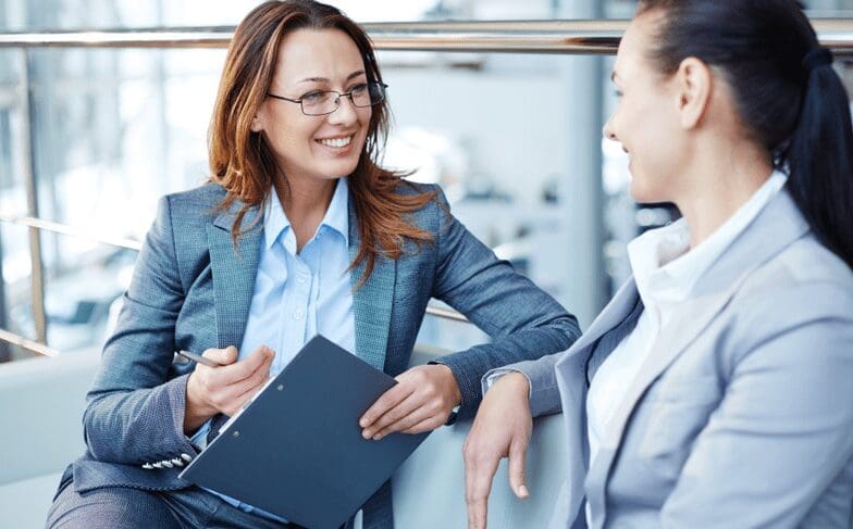 Two women having conversation