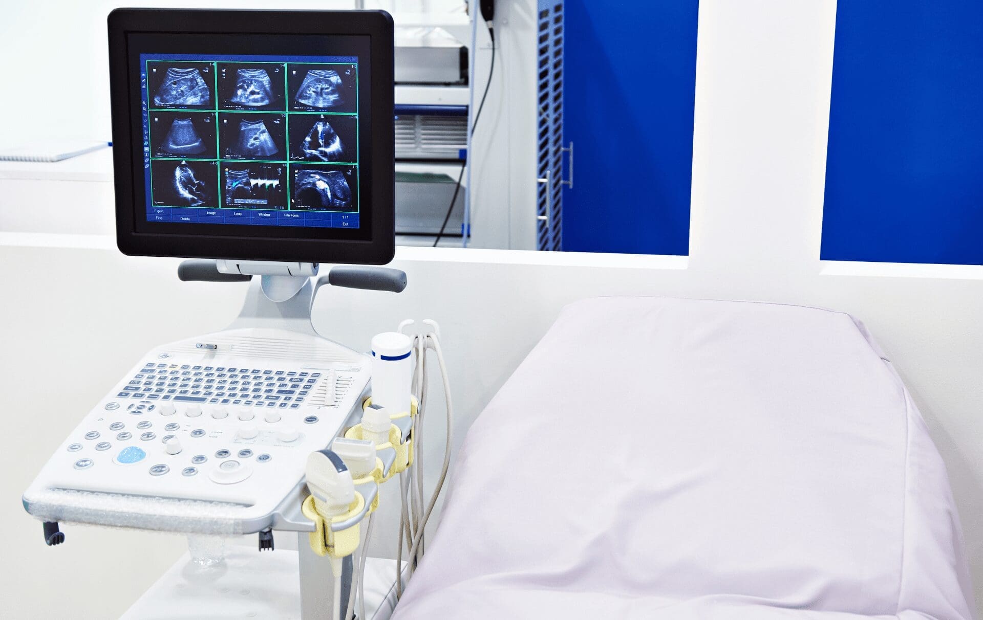 A hospital bed equipped with a monitor