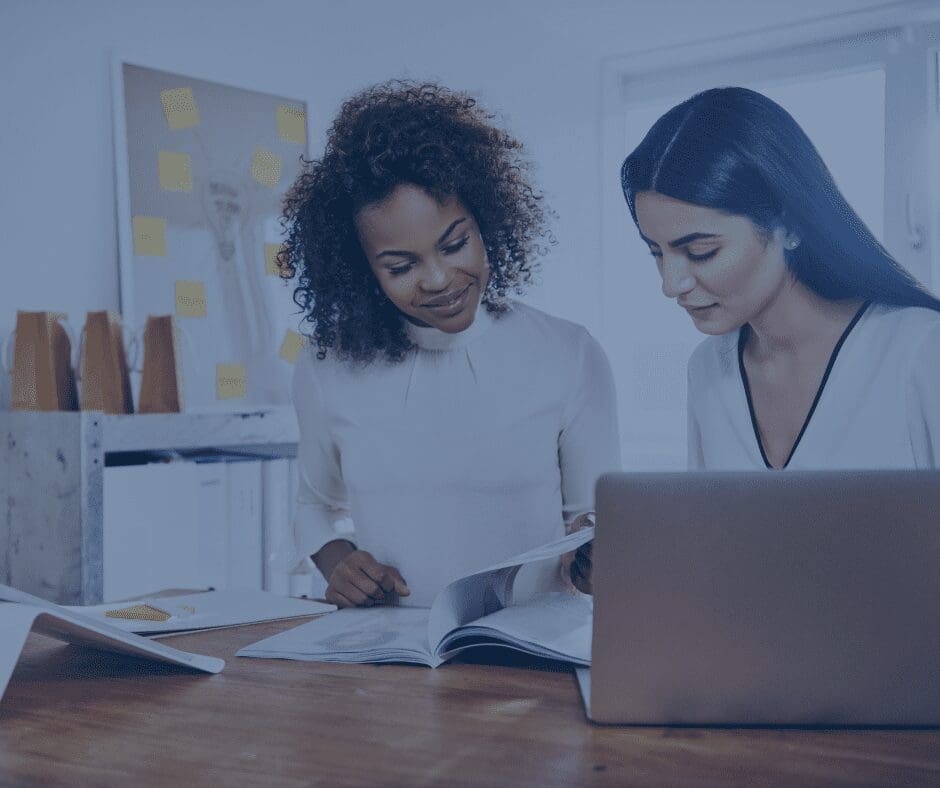 A business individuals reading a book