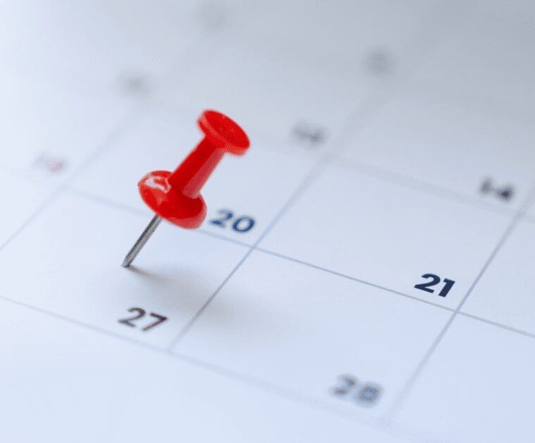 Red pin in a callendar