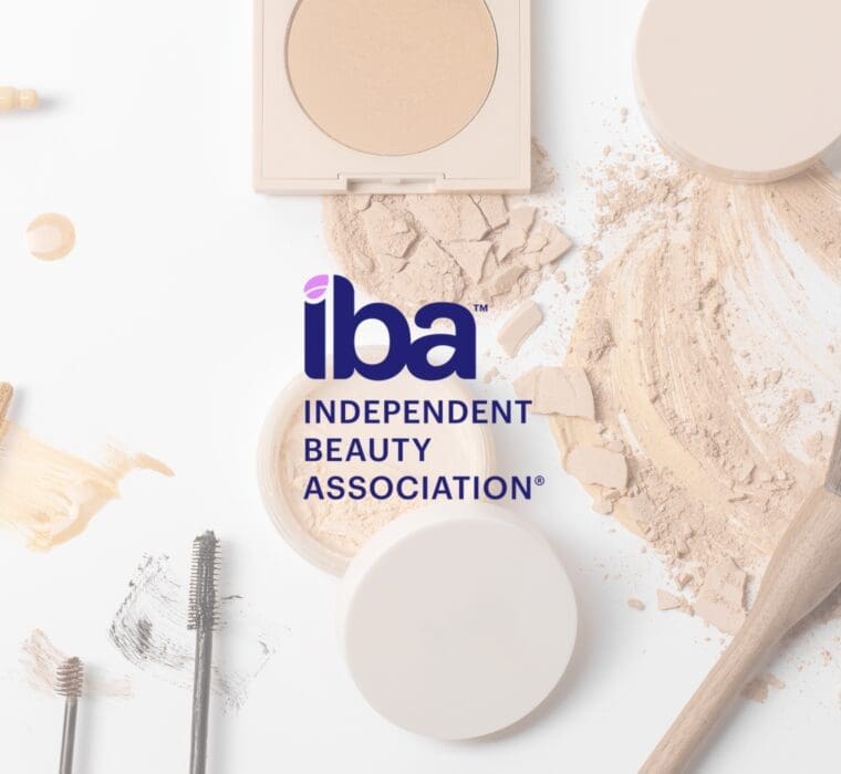 Independent Beauty Association logo over cosmetic products including powder, foundation, and makeup tools.