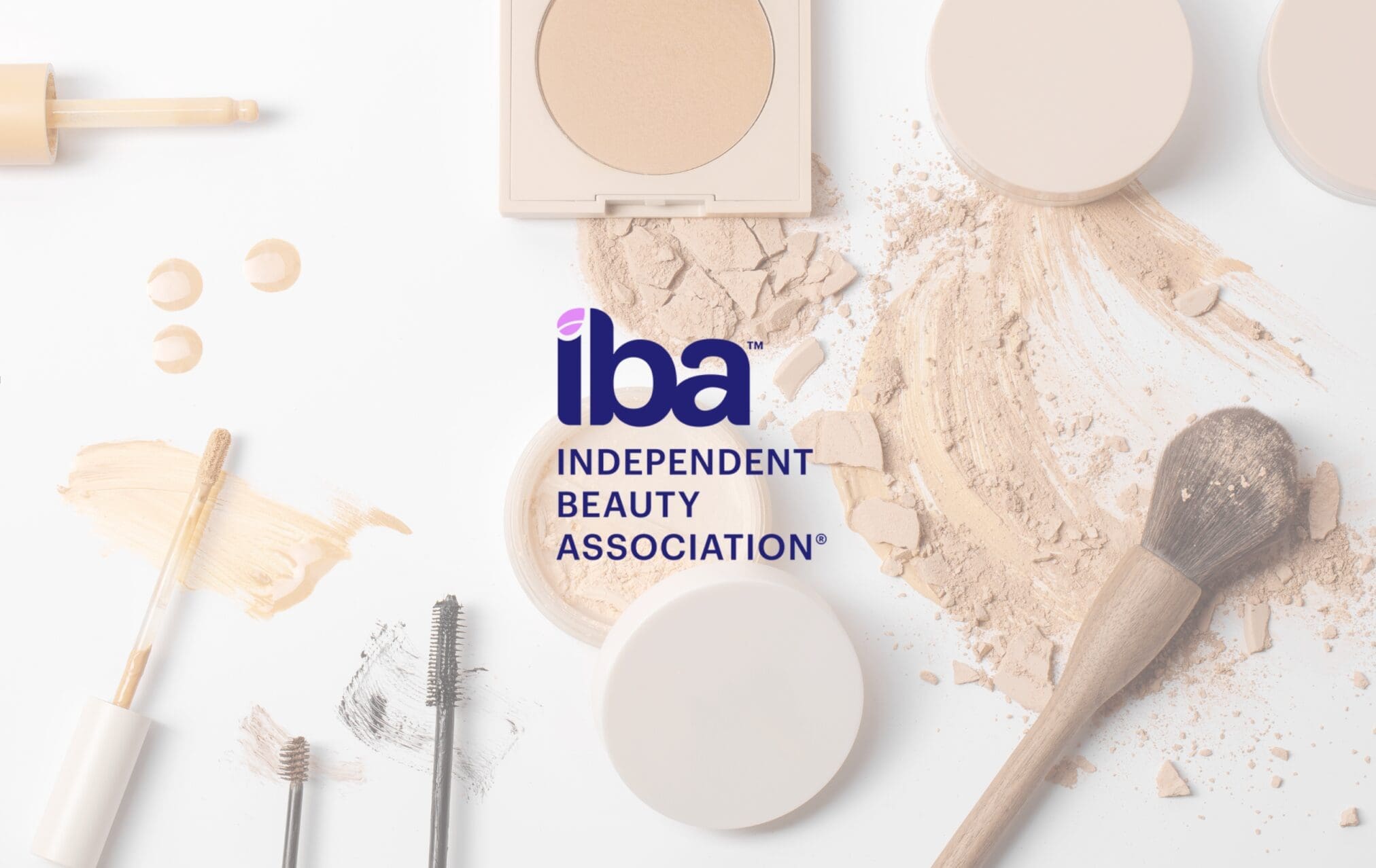 Independent Beauty Association logo over cosmetic products including powder, foundation, and makeup tools.